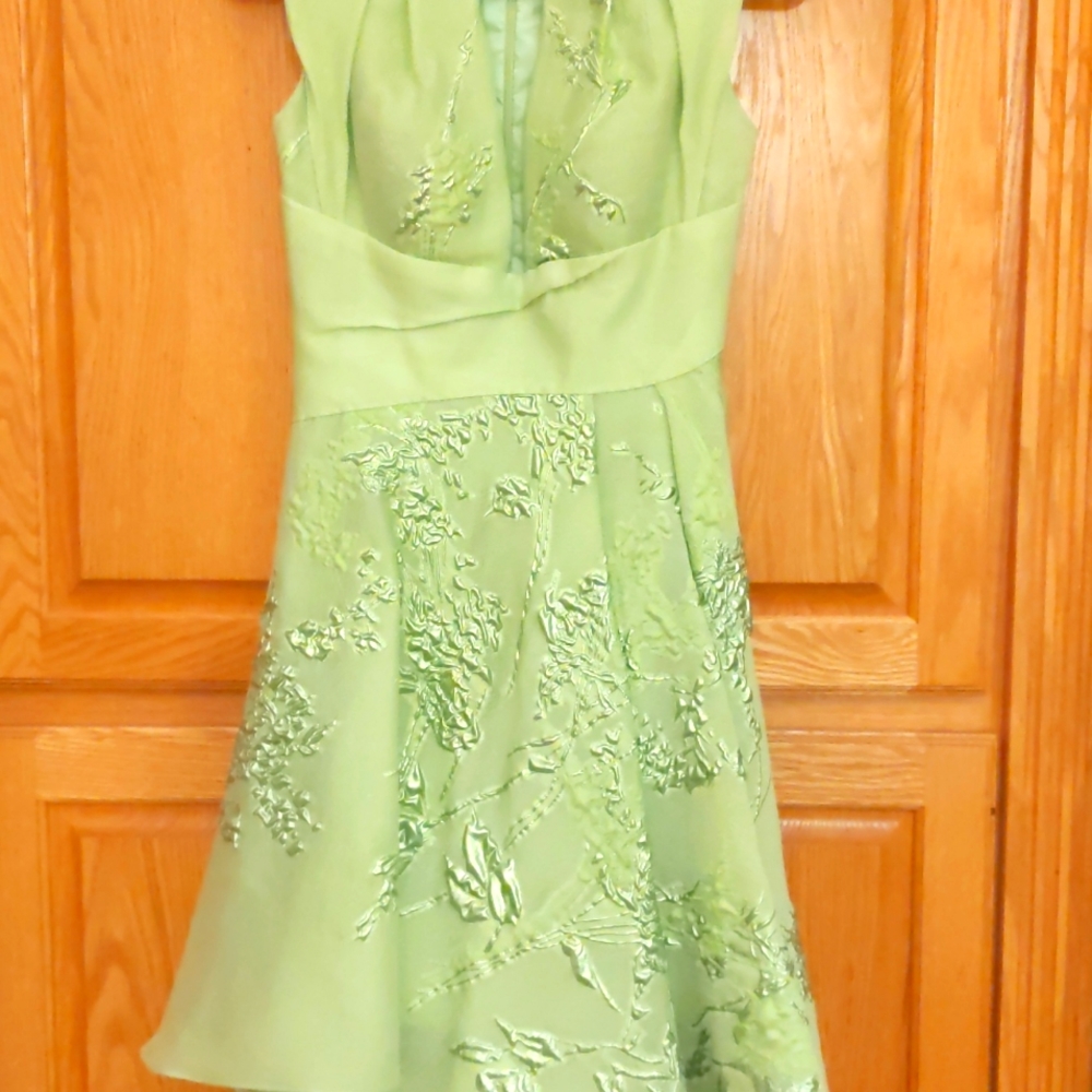 Pristine timeless asymmetrical lime color dress, designer is Rubin Singer